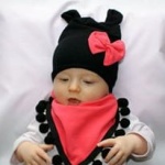 Coral and black set with pom-poms