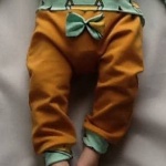 Mustard trousers with foxes bow