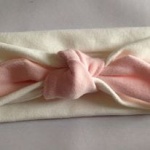 Ecru headband with pink