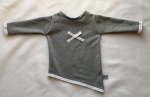 Blouse with lace and bow extended